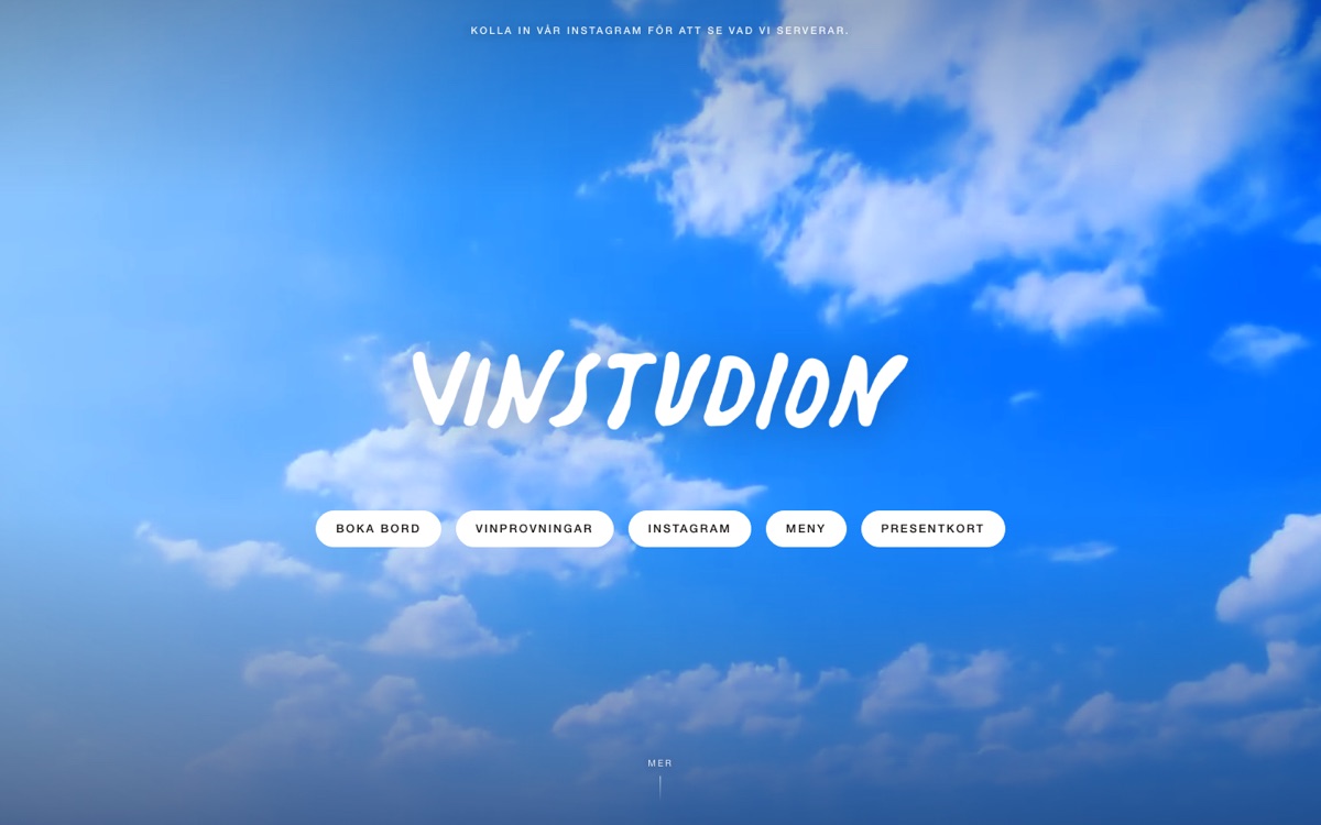 Startsidan för vinstudion.com med logotypen mot en himmel med moln